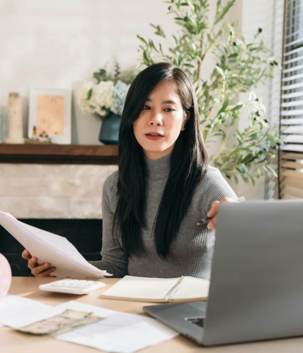close-up-hand-of-business-woman-using-laptop-while-plan-and-discussion-information-for-financial-.jpg